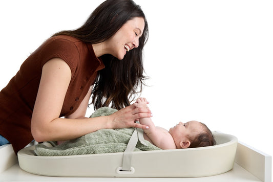 Baby and Mom with wipeable changing pad