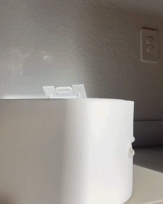 Person converting the potty to a step stool